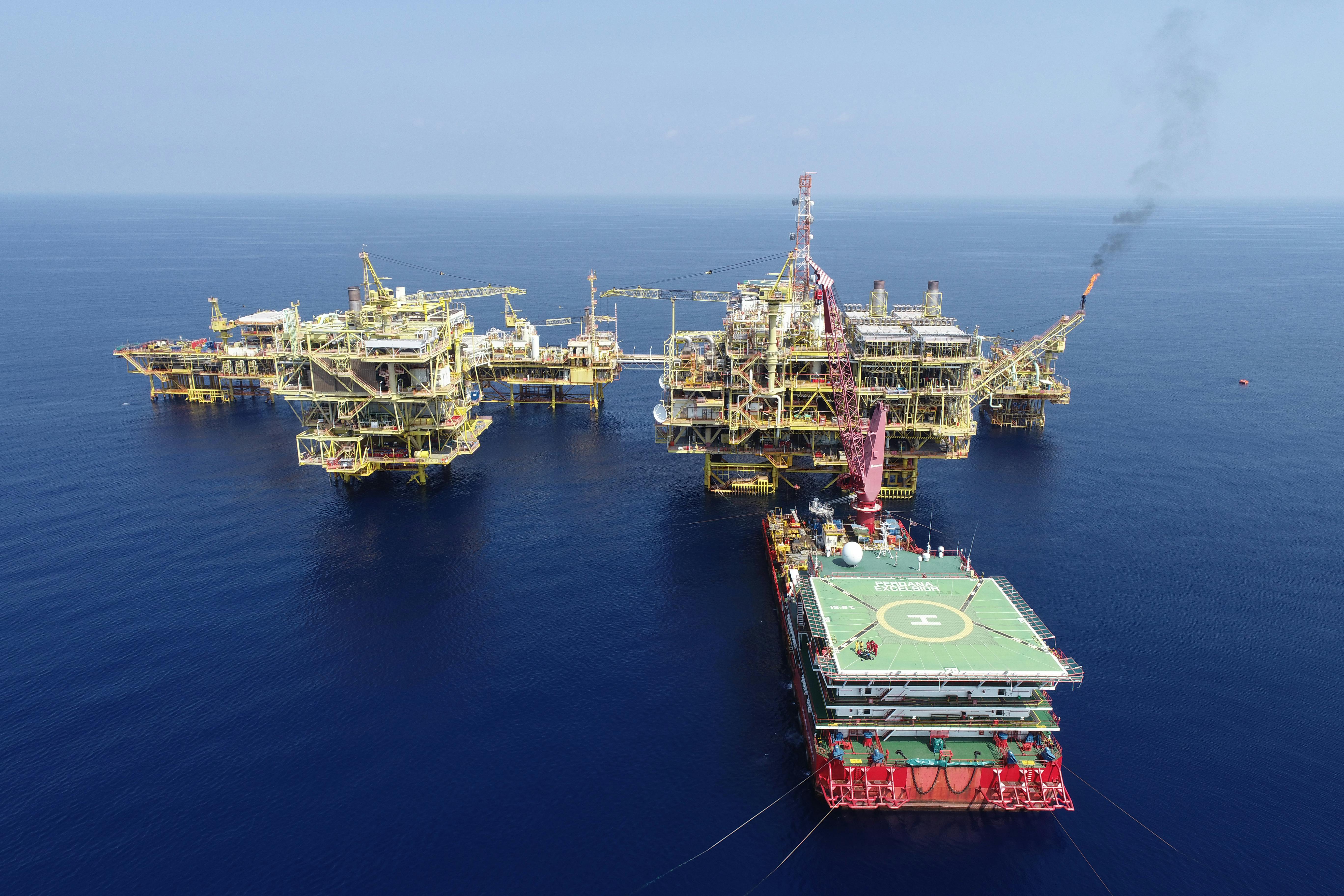 Aerial view of an offshore oil and gas platform complex
