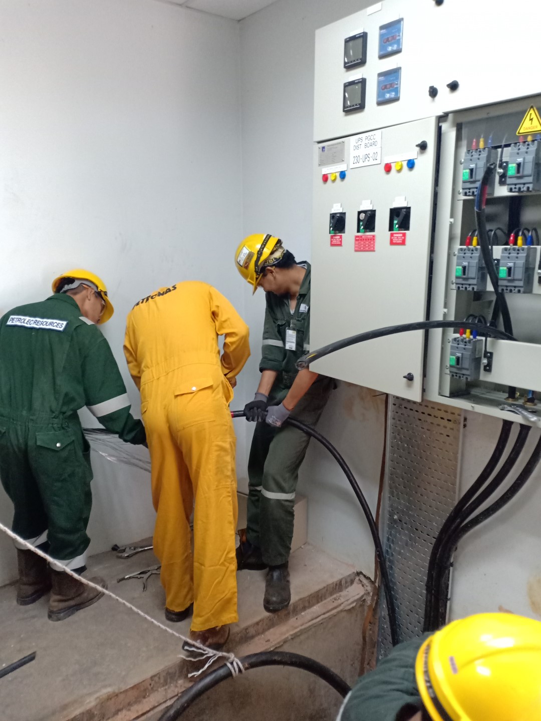 Petrolec engineers at work — distribution board installation